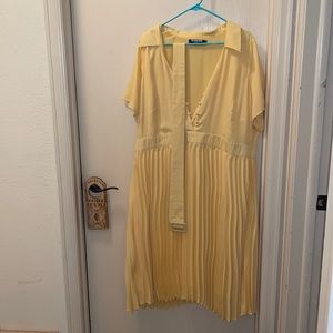 Yellow pleated dress